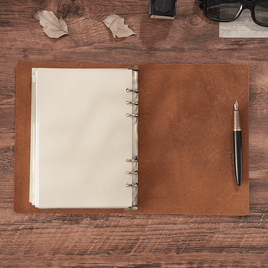 A5 or A4 leather-bound notebook - replaceable inserts - embossed pattern